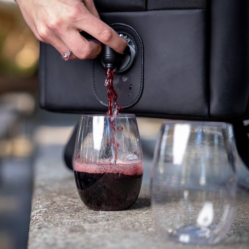 Fly With Wine Suitcases Shark Tank Pouring